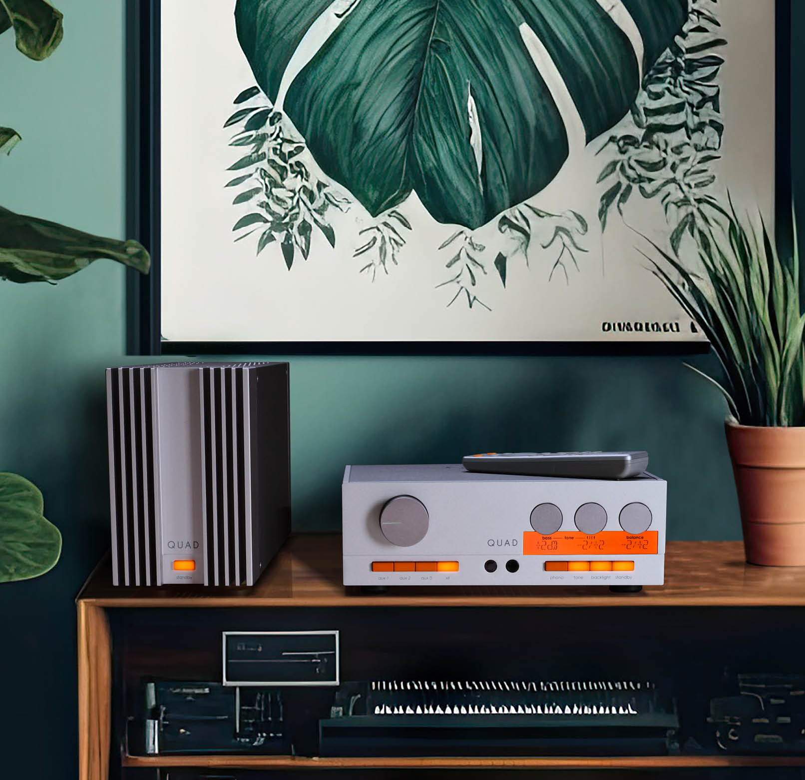 A vintage, wooden bookcase and a hipster home office desk with a desktop computer can be found in a plant filled, green, trendy living room. Generative AI